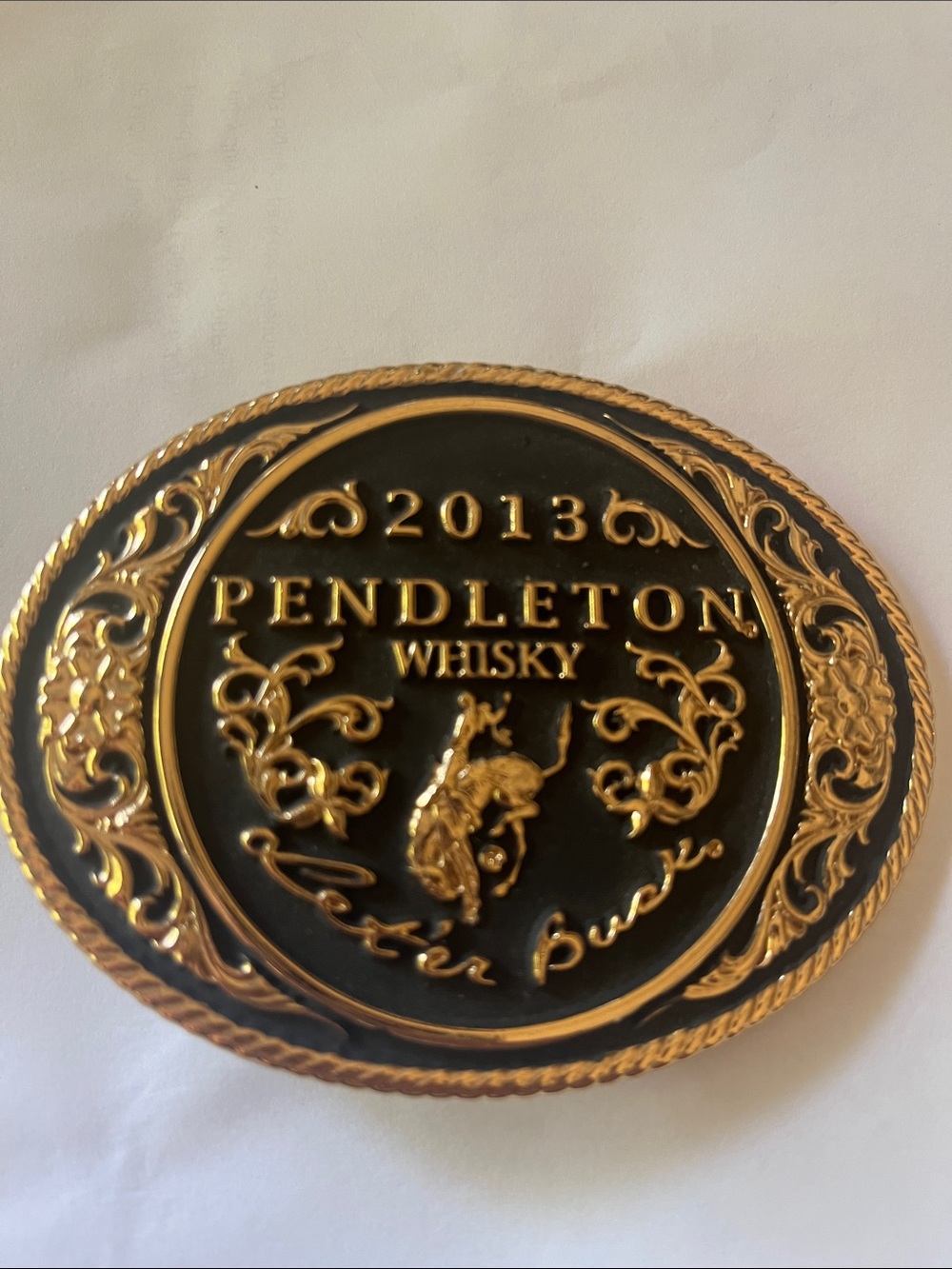 Pendleton Black and Gold 2013 Whiskey Rodeo Belt Buckle. Montana Silversmiths